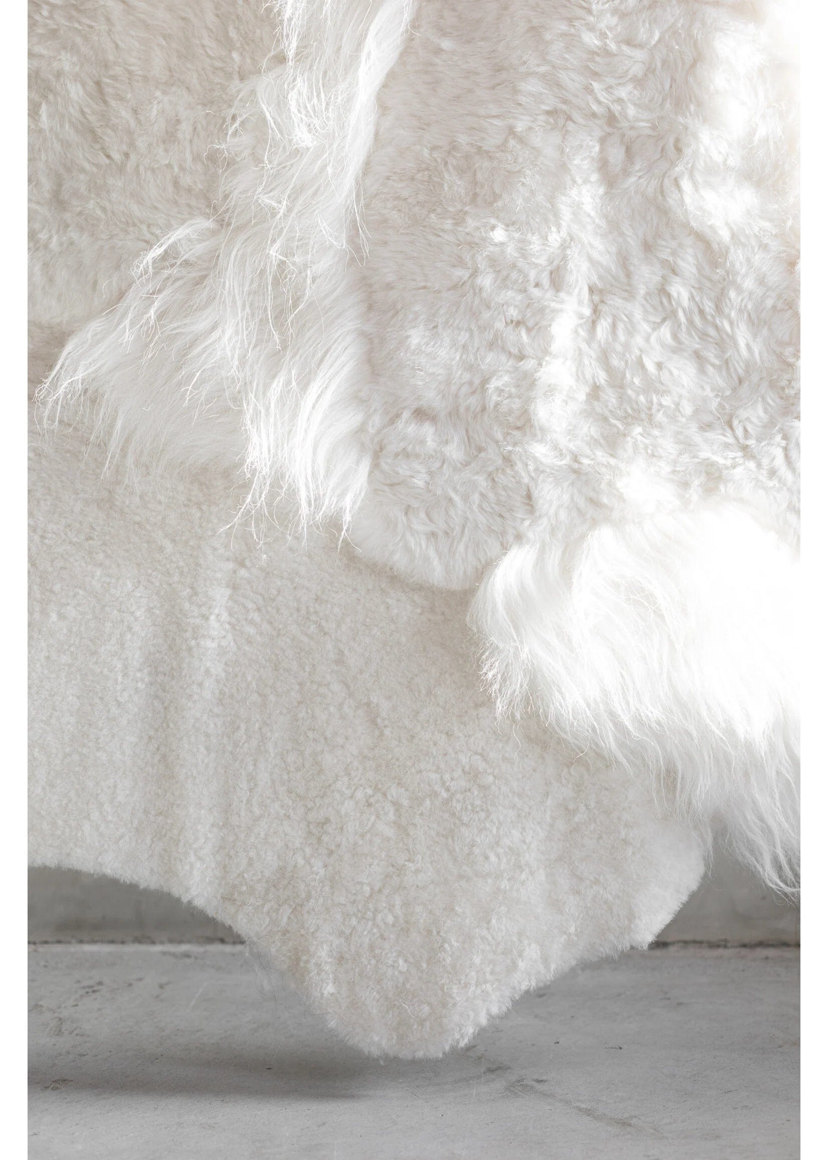 Islandsk lammeskinds tæppe - hvid (Str. 180x120 cm) Lammeskind Uldplaiden.dk